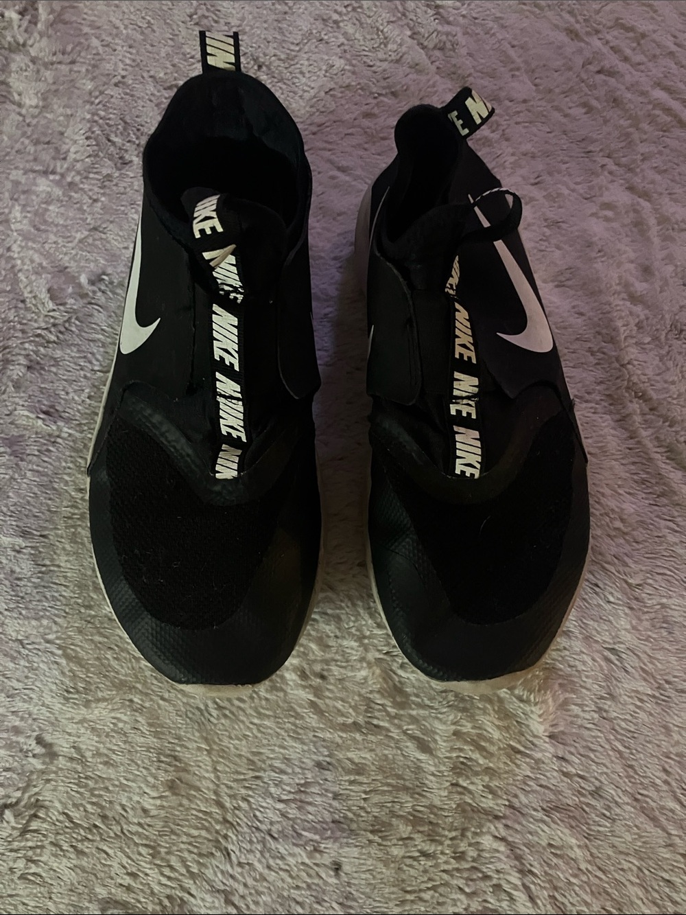 Nike Black Slip-On Athletic Shoes with White Swoosh Accent